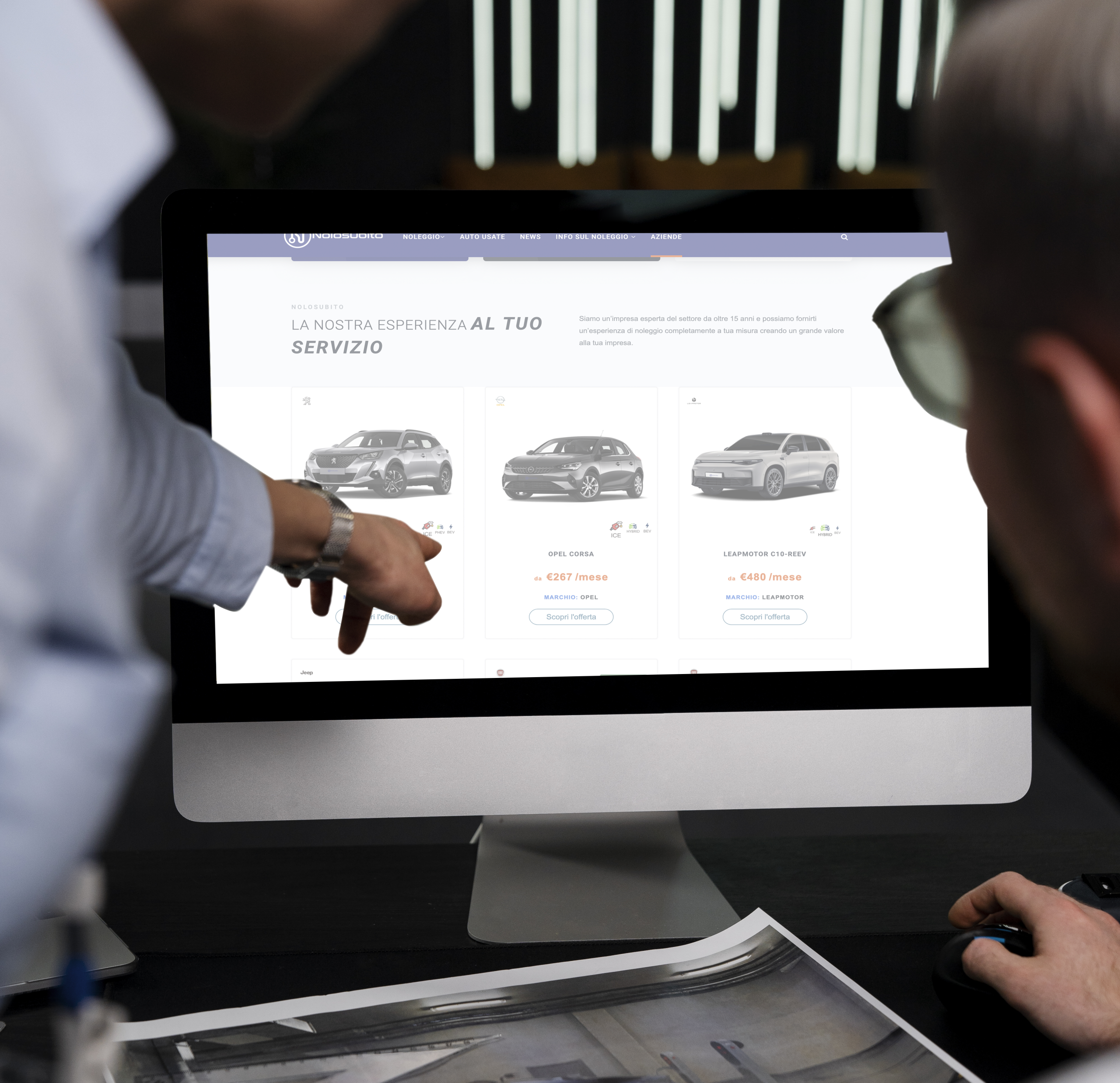 colleagues-working-with-computer-office